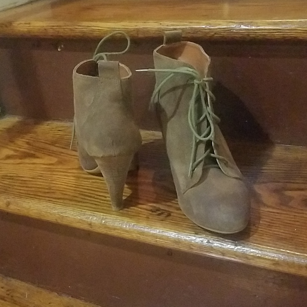 Distressed lace up booties